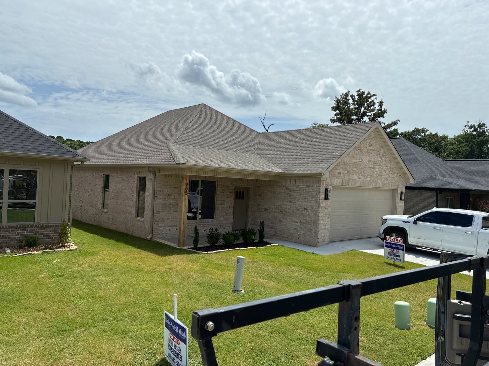 Brick ranch home with fresh gutter installation
